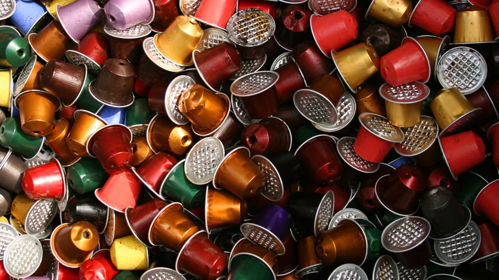 A variety of coffee capsules - plastic, aluminium, compostable